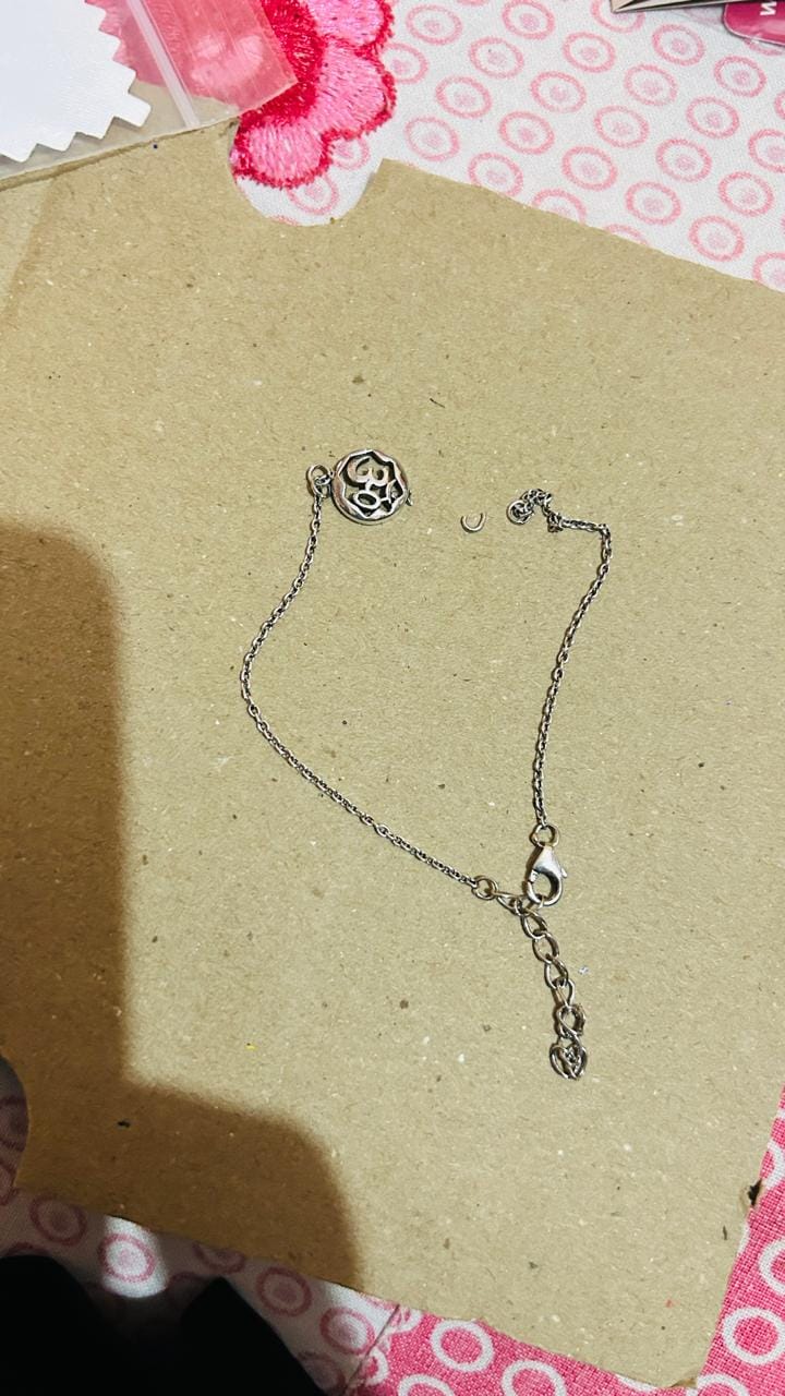 Customer photo review of Silver Om Sphere Bracelet Rakhi