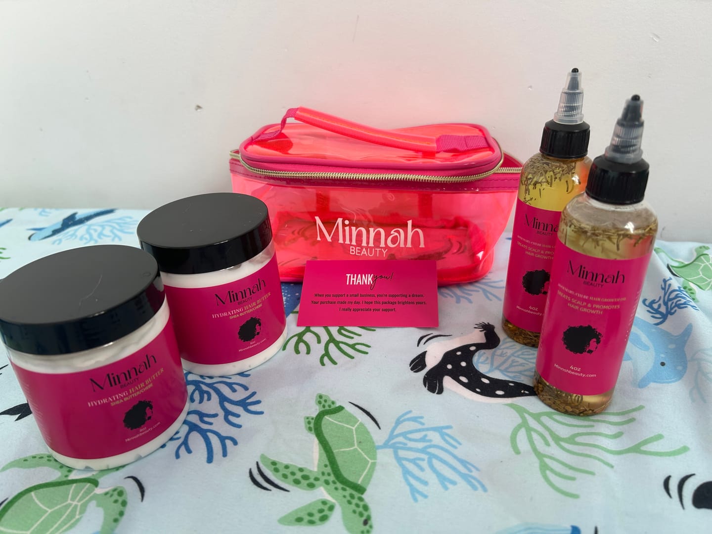Customer photo review of The Ultimate Hair Growth Bundle (4oz Oil + 8oz Butter) + FREE Bag
