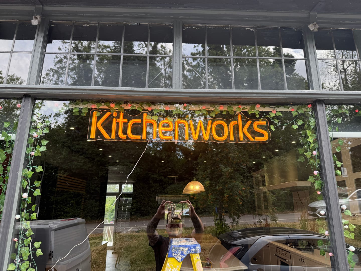 Customer photo review of 3 Tabletop Signs + 10 Keychains