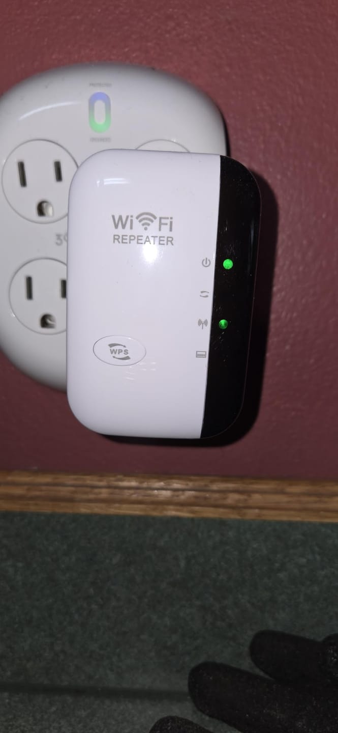 Customer photo review of SignalMax WiFi Extender