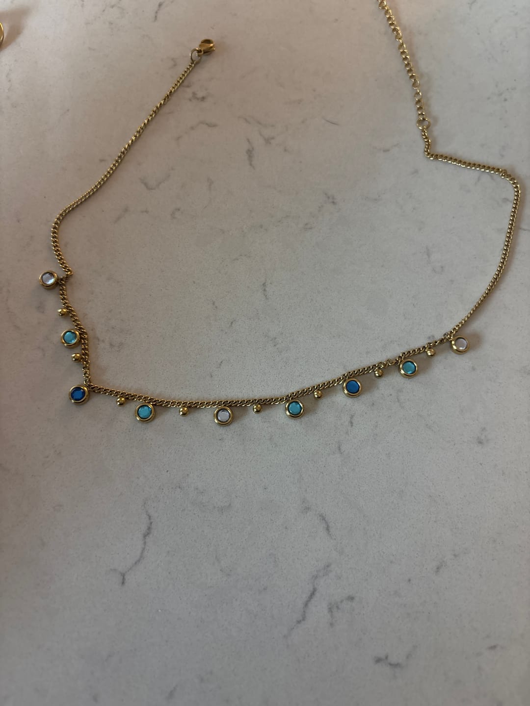 Customer photo review of Grace Gold Blue Droplet Necklace