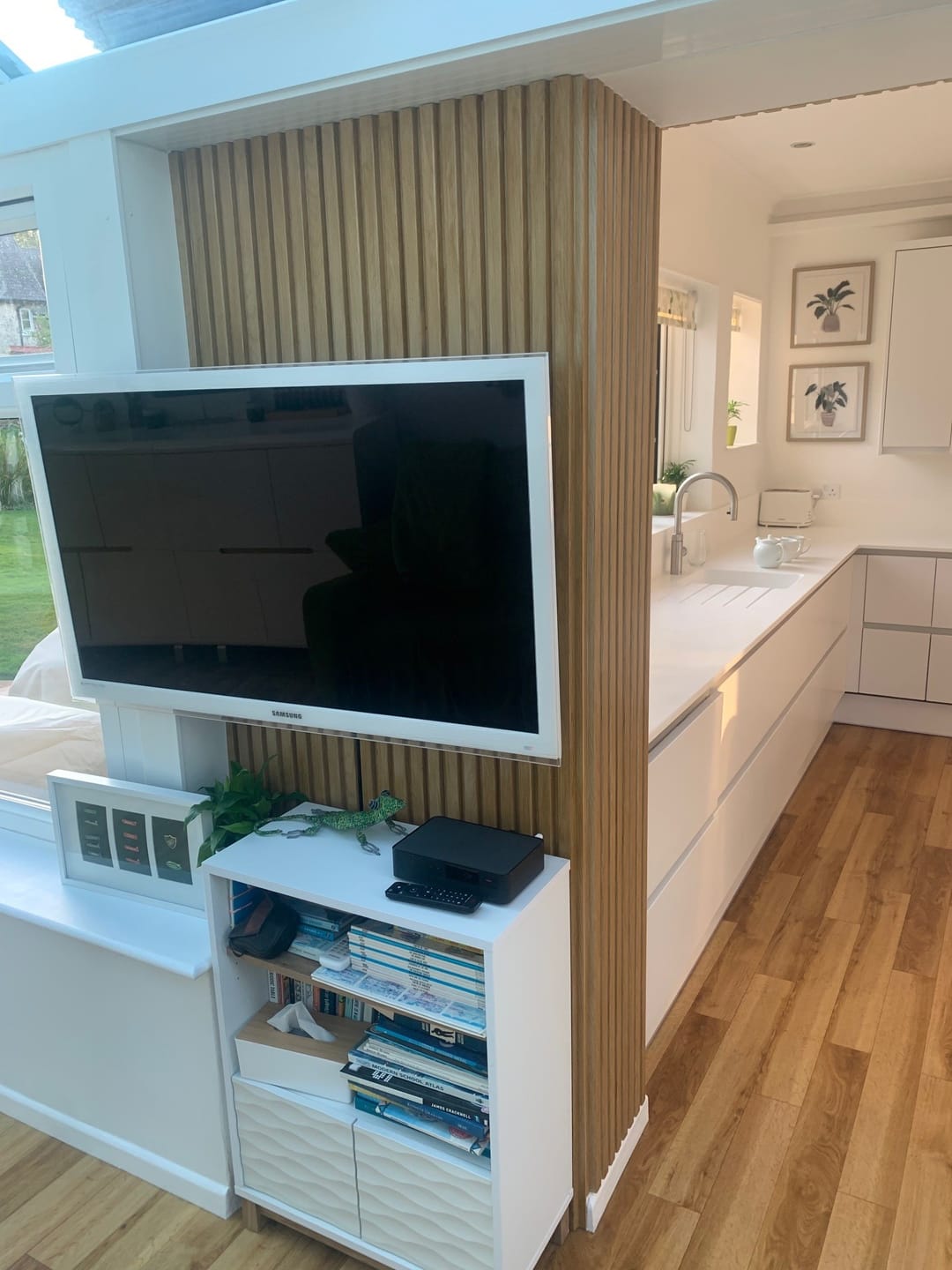 Customer photo review of SlatWall Waterproof Natural Oak Wall Panel