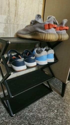 Customer photo review of Four-Tier X-Frame Shoe Rack with Dustproof Shelf Covers