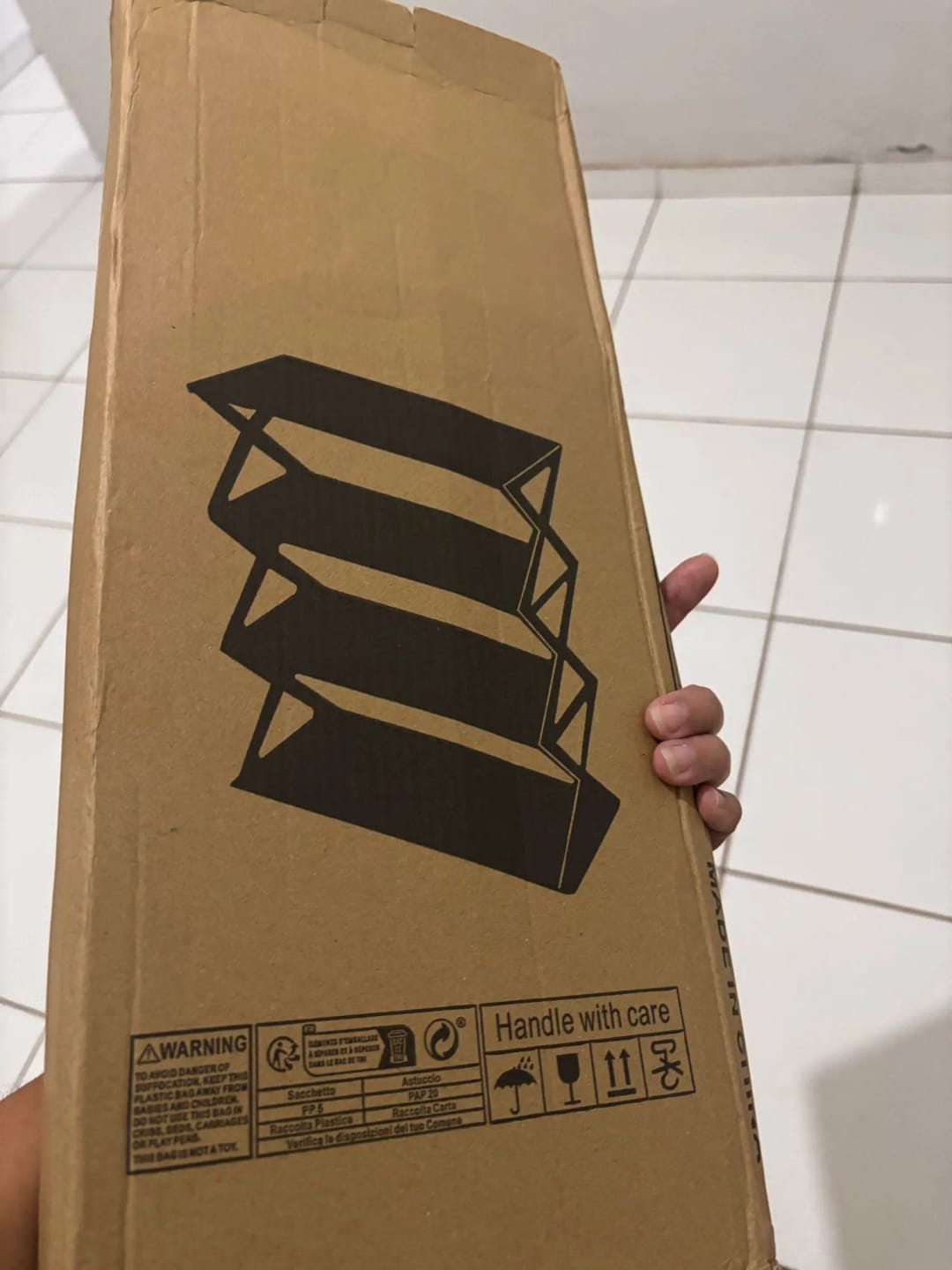 Customer photo review of Four-Tier X-Frame Shoe Rack with Dustproof Shelf Covers