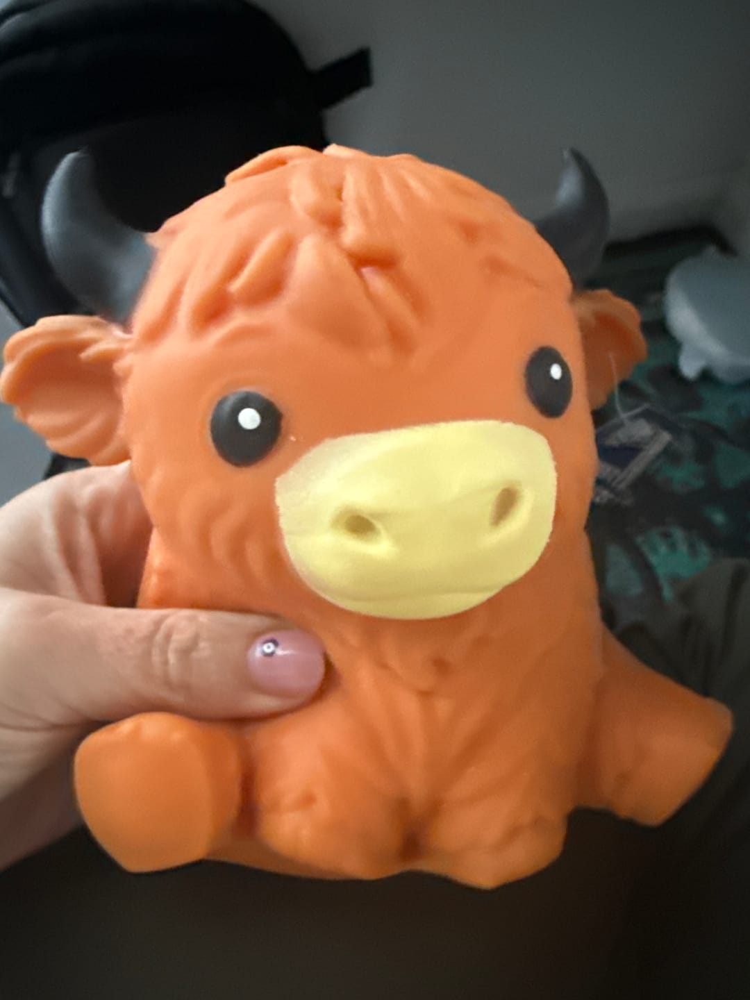 Customer photo review of Giant Durable Squishy Highland Cow