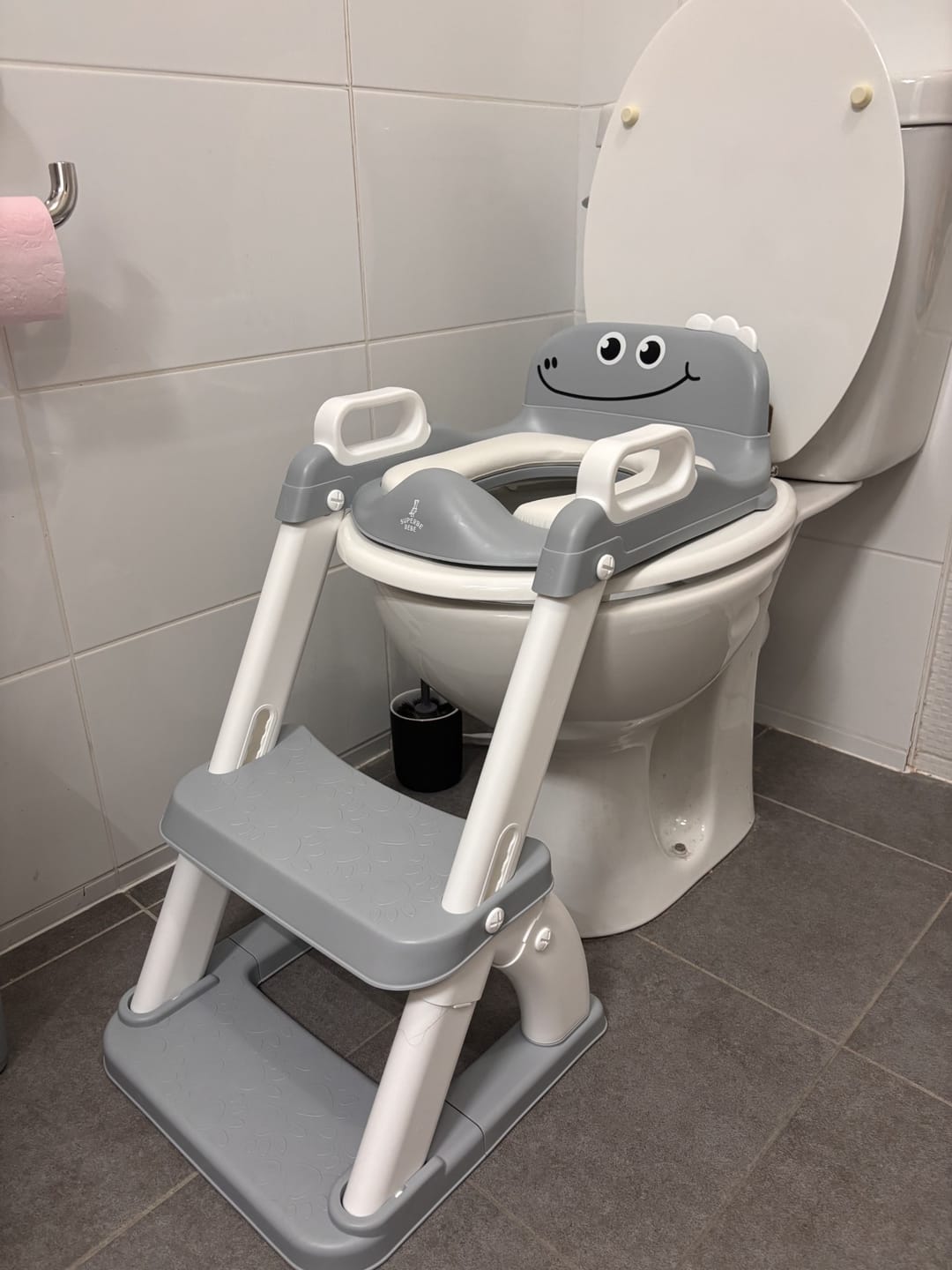 Customer photo review of Réducteur de toilette DINO avec marche pliable