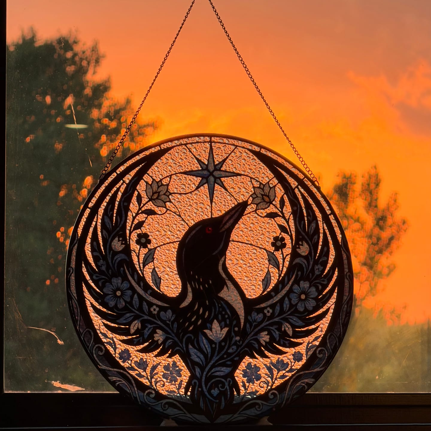 Customer photo review of Floral Rebel Loon Stained Glass Suncatcher - Minnesota Bird