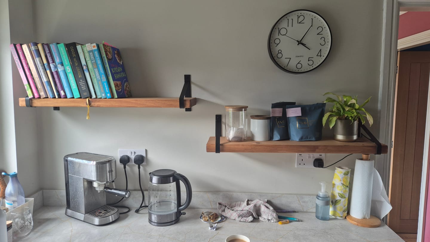 Customer photo review of Rustic Wooden Wall Shelves with Triangle Metal Wall Brackets