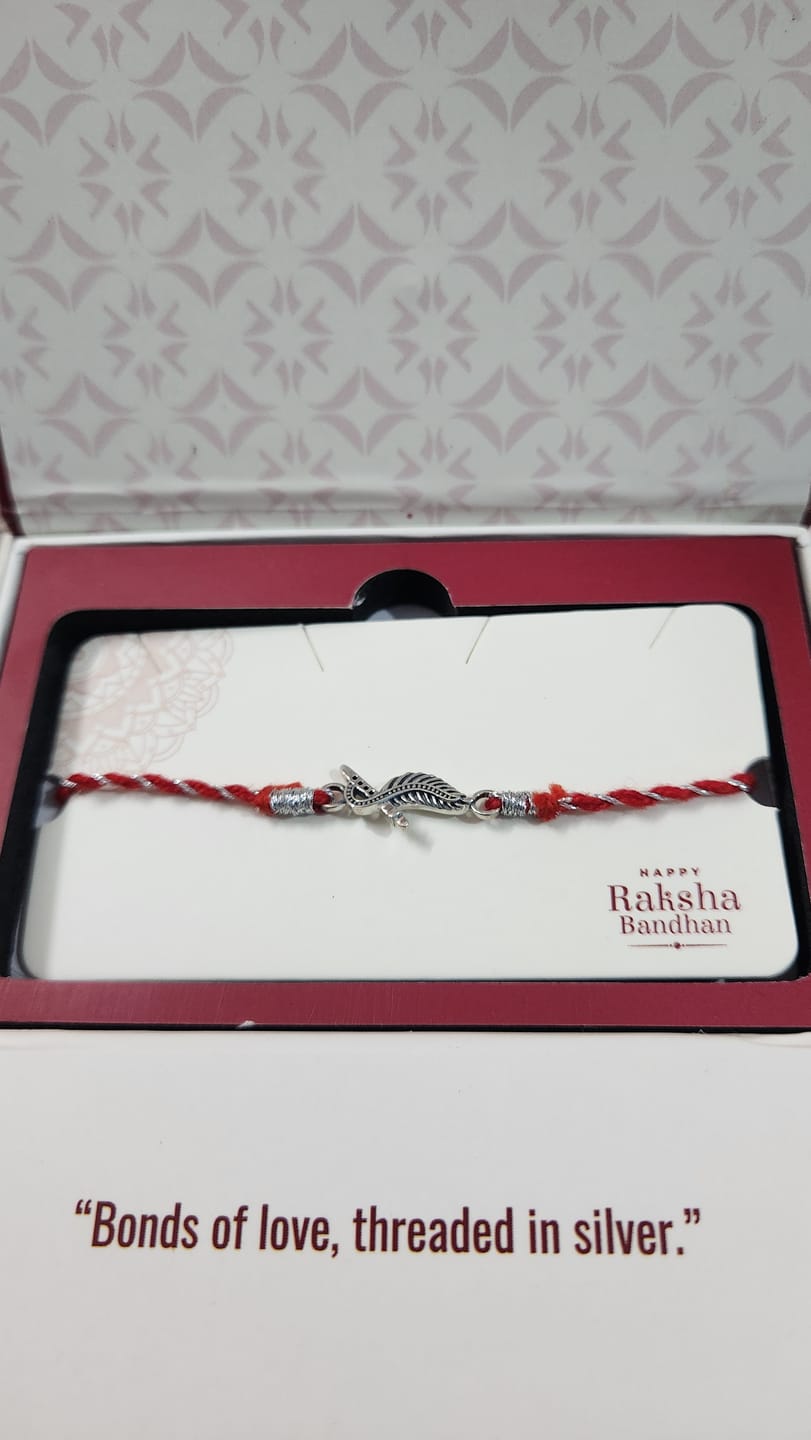 Customer photo review of Oxidised Silver Krishna Rakhi
