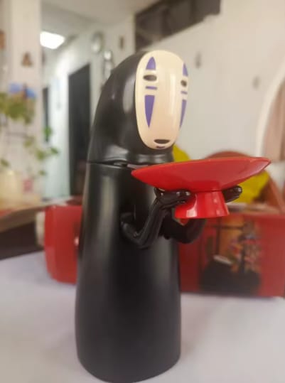 Customer photo review of Wander Spirit™ – Alcancía Sin Rostro