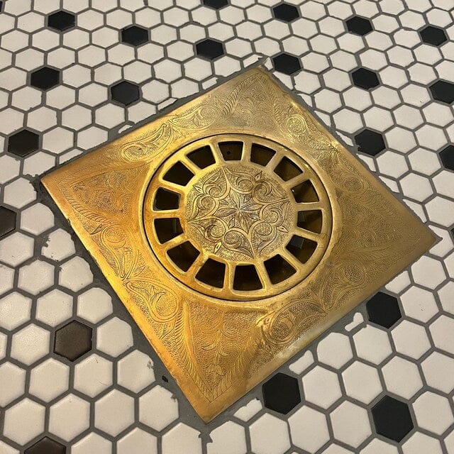 Customer photo review of Unlacquered Engraved Brass Floor Drain