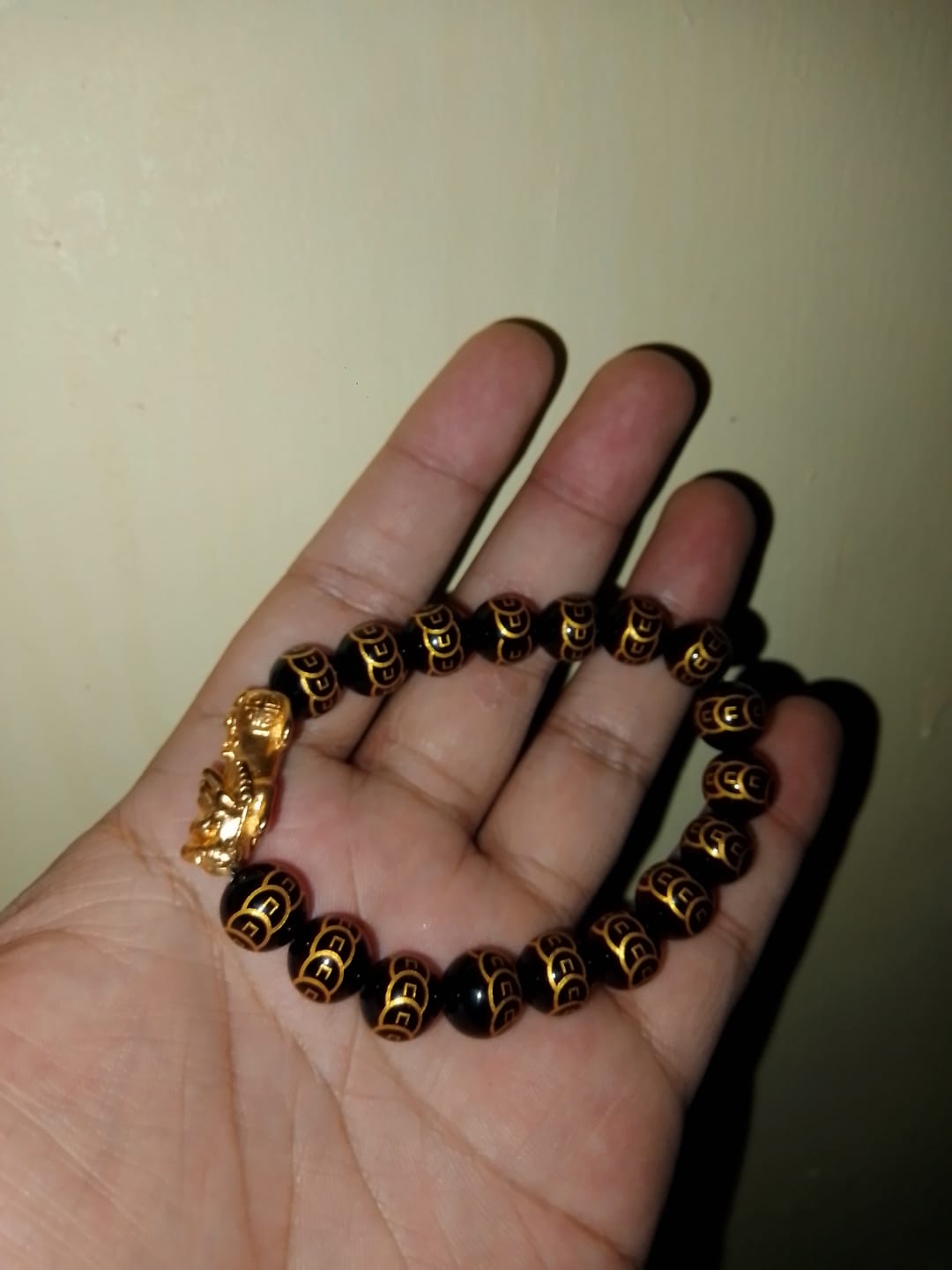 Customer photo review of 9 Coins 10mm Black Onyx w/ Lucky PiYao for Good Fortune and Flow of Prosperity