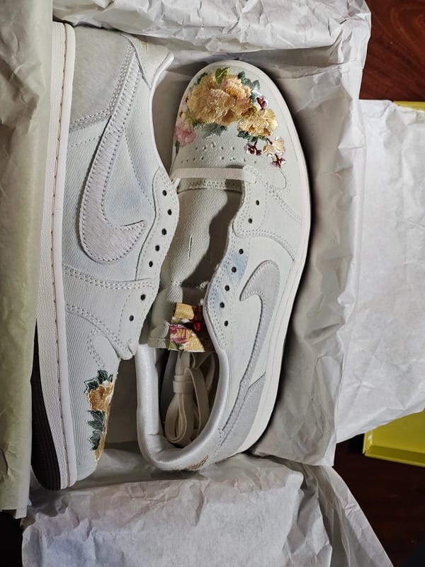 Customer photo review of Jordan 1 Retro Low OG Chinese New Year (2026)