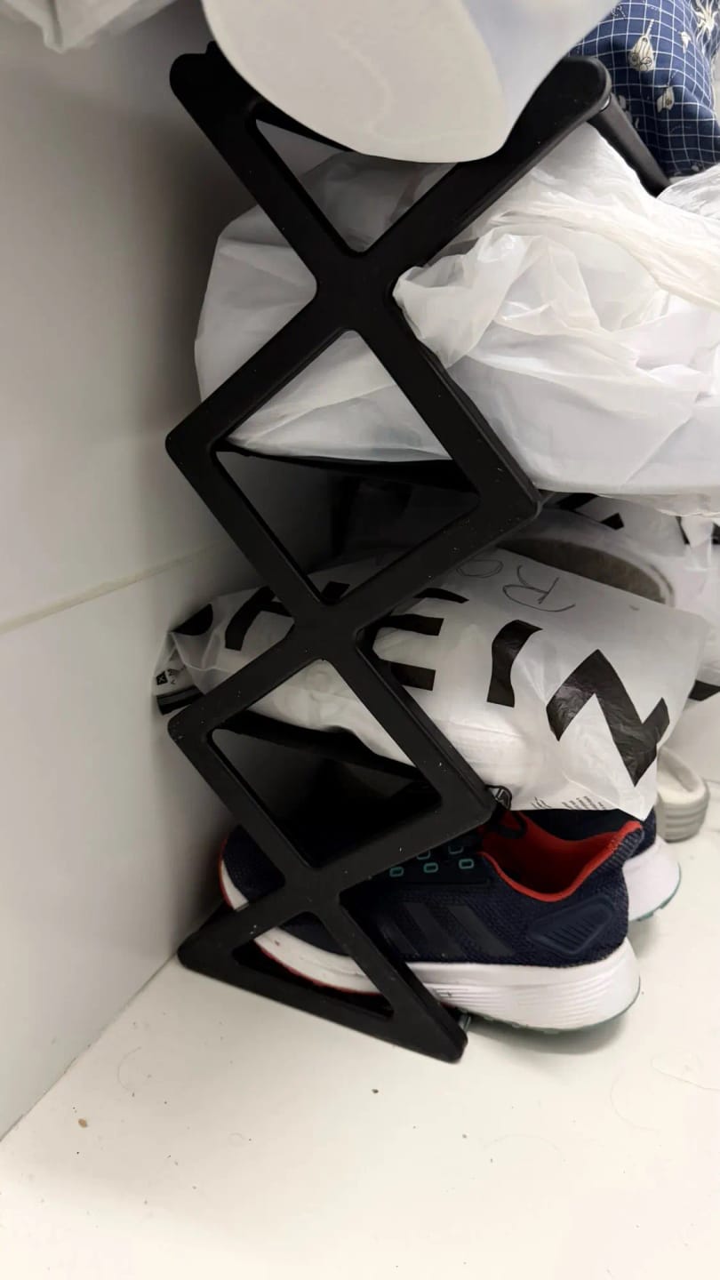 Customer photo review of Four-Tier X-Frame Shoe Rack with Dustproof Shelf Covers