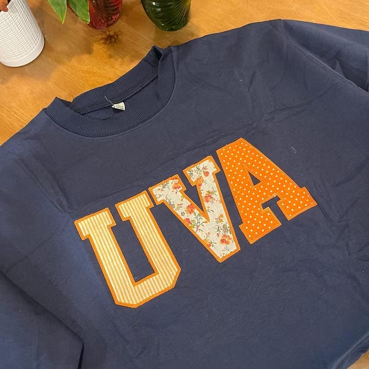 Customer photo review of Custom Patchwork Fabric Embroidered Sweatshirt Team and School Name Applique Varsity Letters