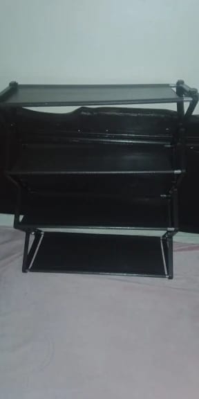 Customer photo review of Four-Tier X-Frame Shoe Rack with Dustproof Shelf Covers