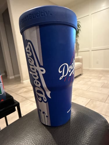 Customer's blue and white Los Angeles Dodgers Bottle Buddy standing on a dark surface.