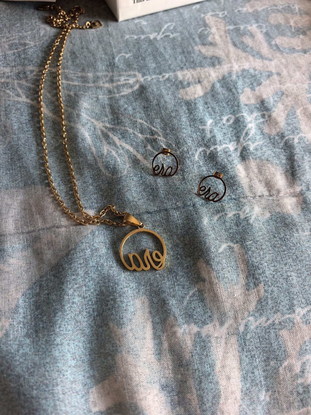 Customer photo review of Gold Era Logo Studs