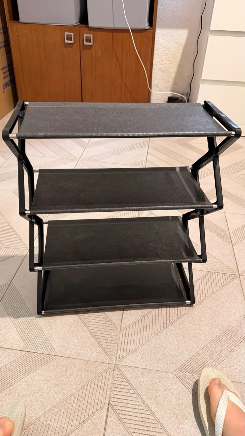 Customer photo review of Four-Tier X-Frame Shoe Rack with Dustproof Shelf Covers