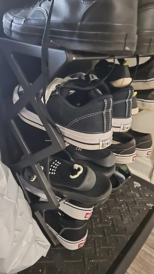 Customer photo review of Four-Tier X-Frame Shoe Rack with Dustproof Shelf Covers