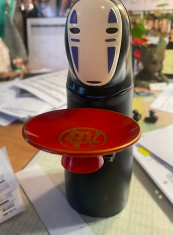 Customer photo review of Wander Spirit™ – Alcancía Sin Rostro