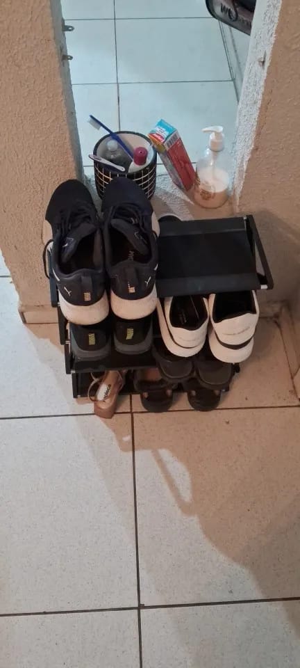 Customer photo review of Four-Tier X-Frame Shoe Rack with Dustproof Shelf Covers