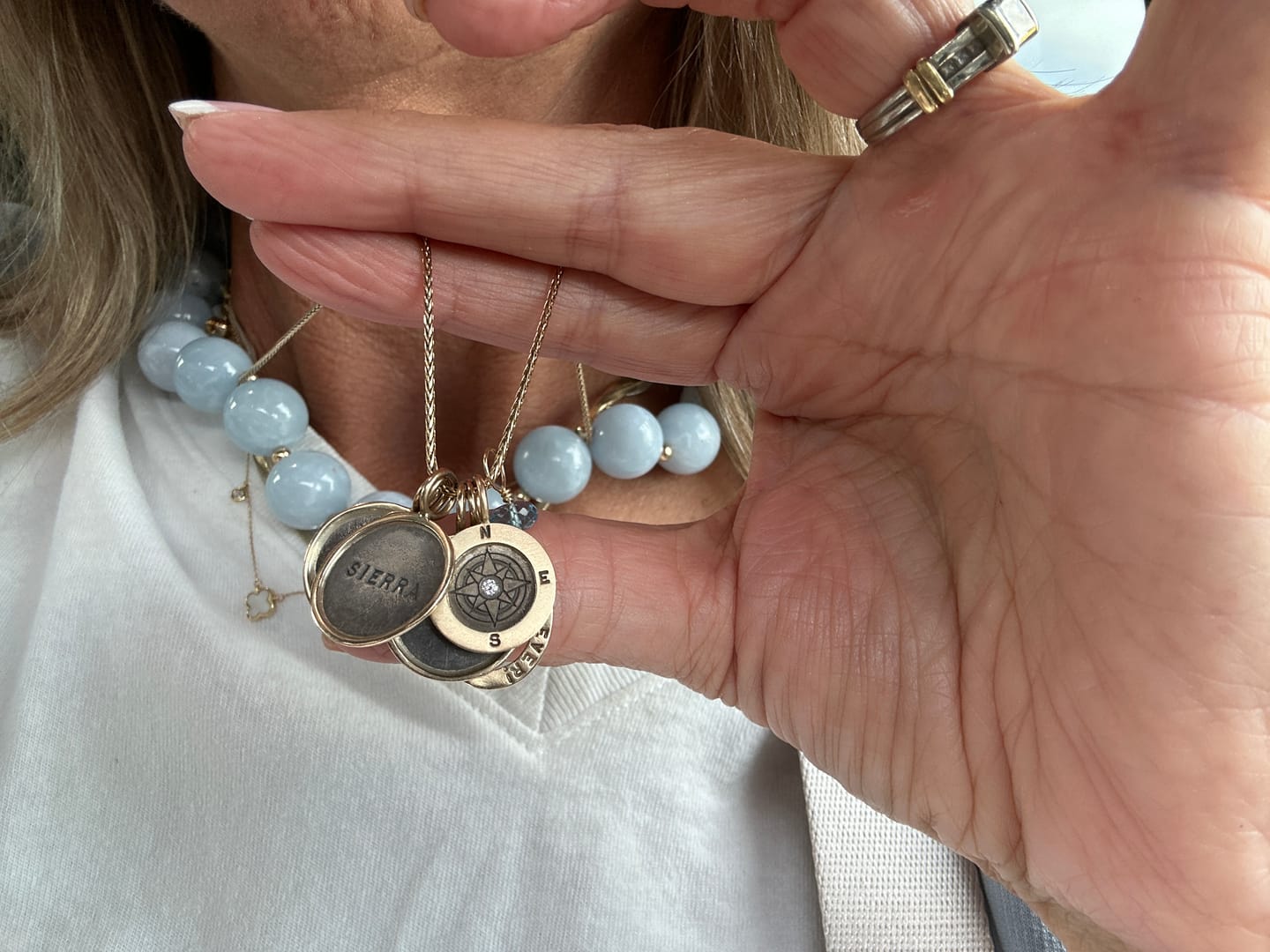 Customer photo review of Compass Framed Round Charm