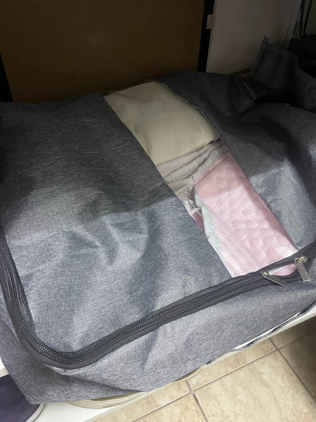 Customer photo review of Foldable Under-Bed Storage Bag for Clothing, Quilts, and Blankets