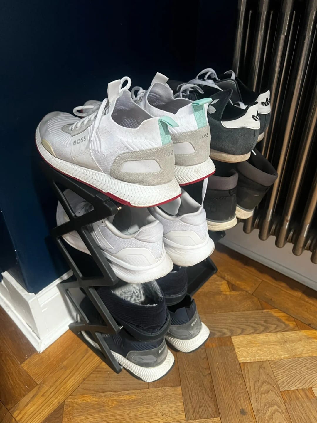 Customer photo review of Four-Tier X-Frame Shoe Rack with Dustproof Shelf Covers