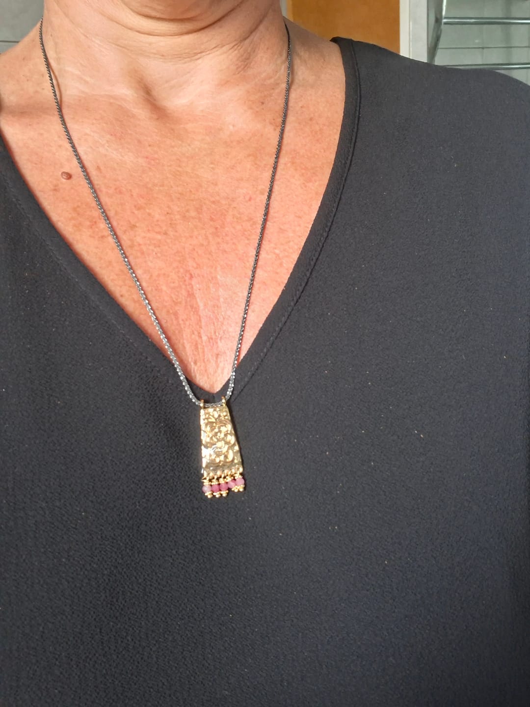 Customer photo review of Oriental Chased Floral Rectangle Pendant Necklace