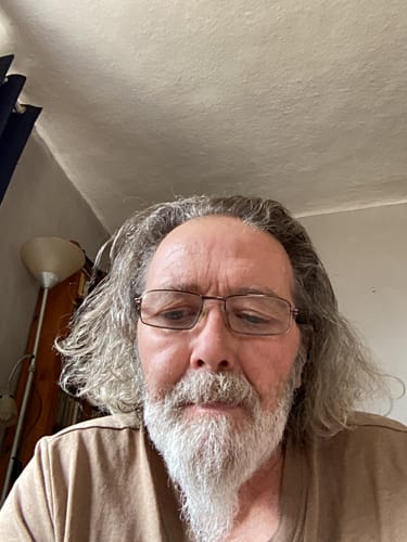 Reviewer's selfie in an indoor setting.