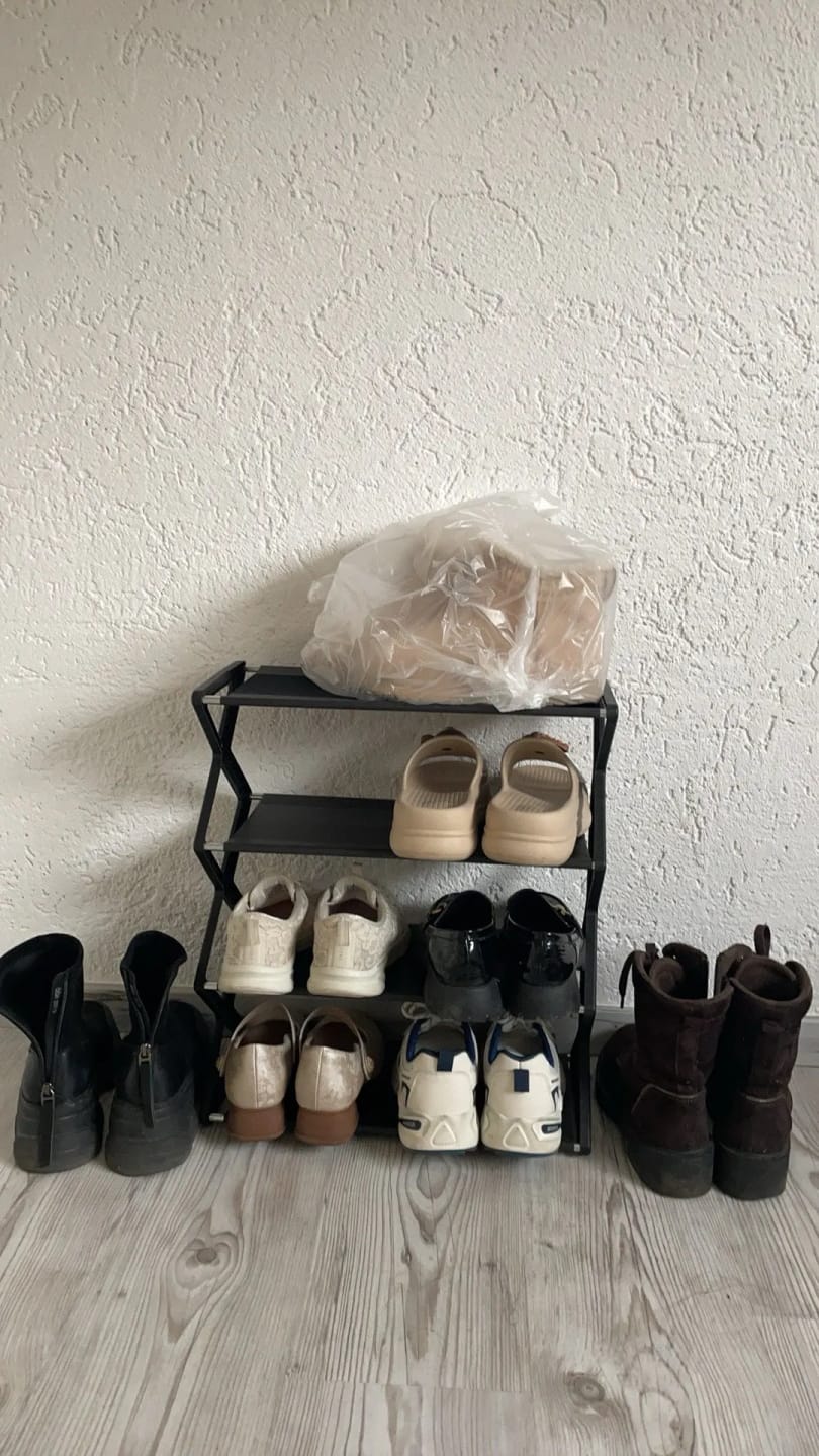 Customer photo review of Four-Tier X-Frame Shoe Rack with Dustproof Shelf Covers