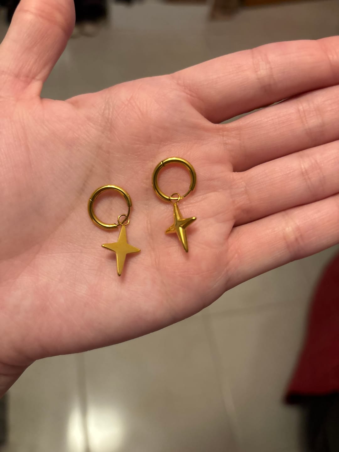 Customer photo review of Par Arracada Con Estrella 2 en 1