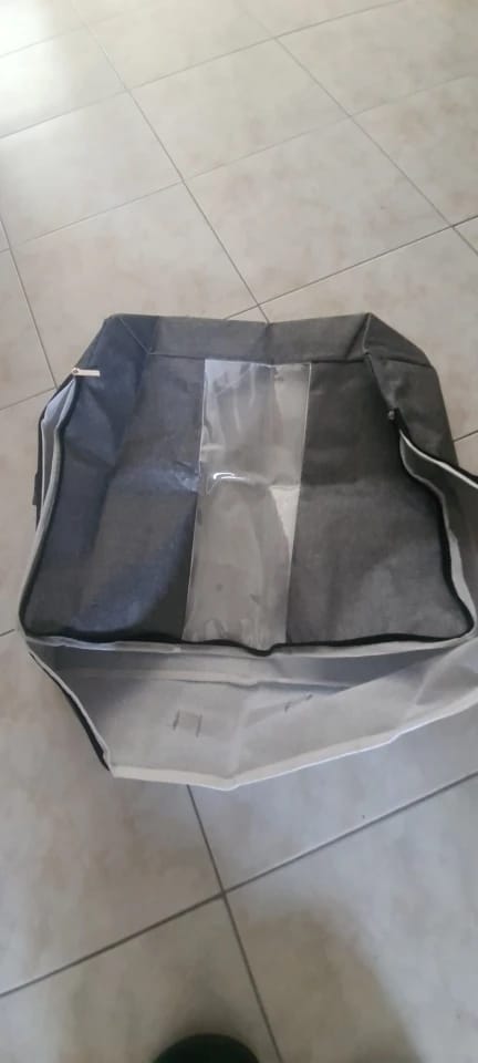 Customer photo review of Foldable Under-Bed Storage Bag for Clothing, Quilts, and Blankets