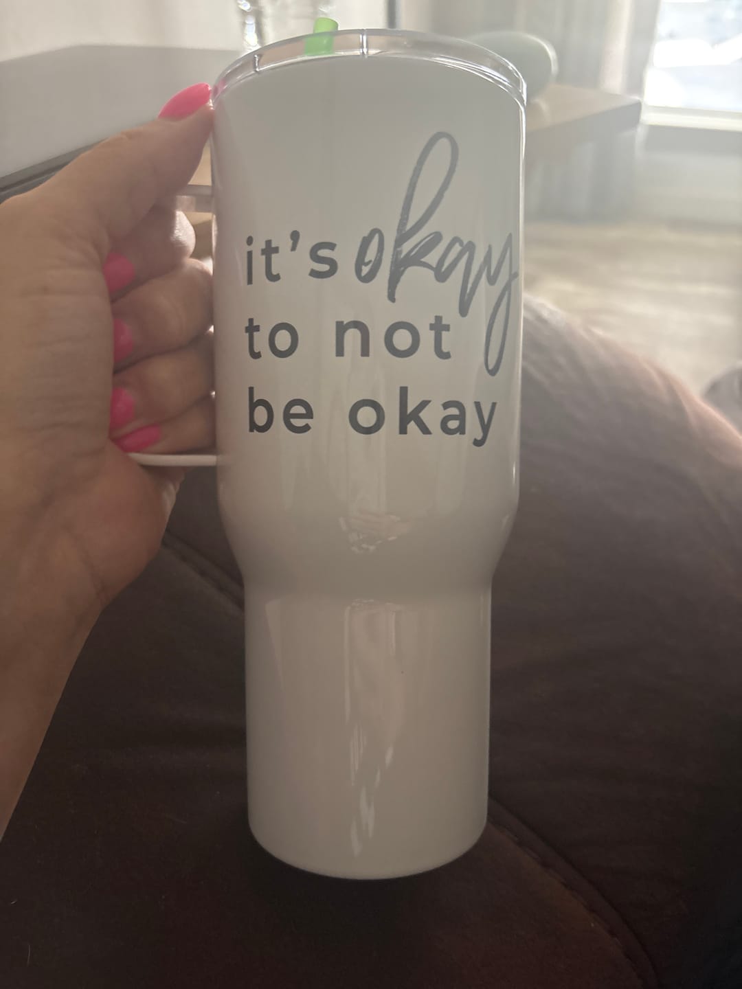 Customer photo review of It's Okay To Not Be Okay Travel mug with a handle