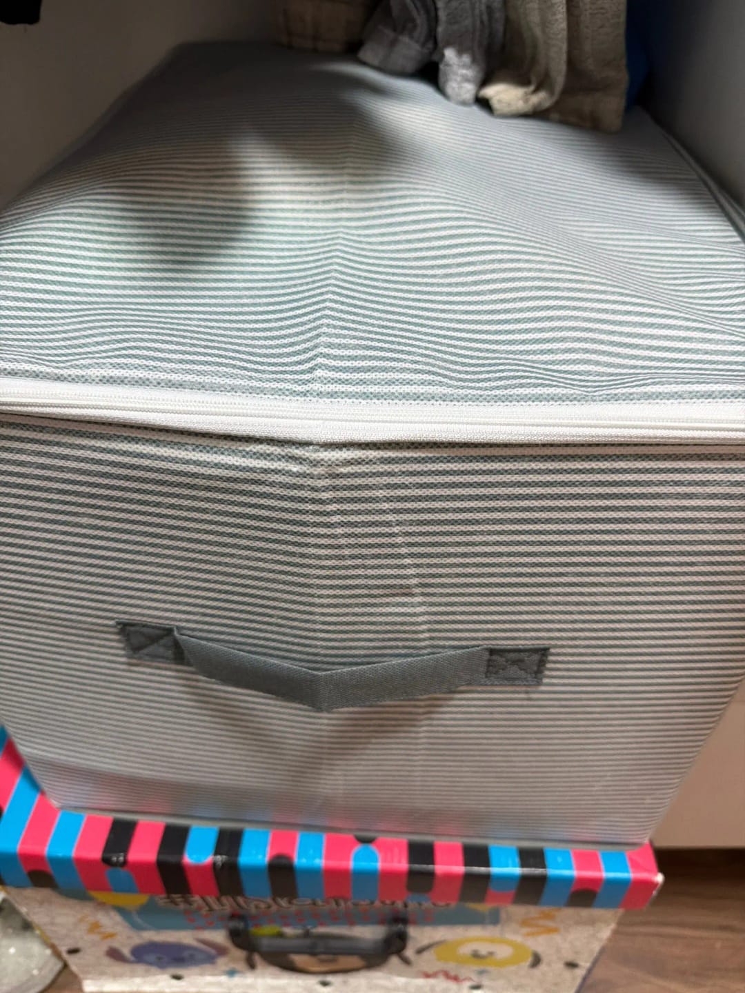 Customer photo review of Foldable Lockable Storage Box for Clothes, Blankets, and Toys
