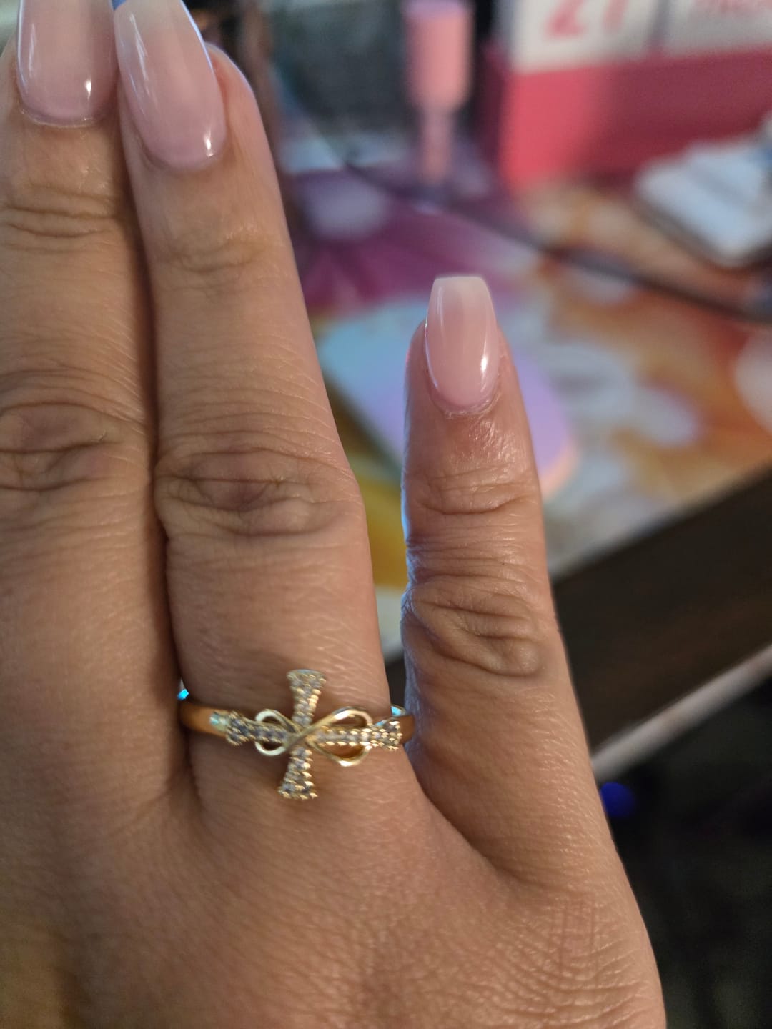 Customer photo review of Christianartworkshop Golden/Silver Mobius Cross Ring: Carry His Grace in Daily Wear
