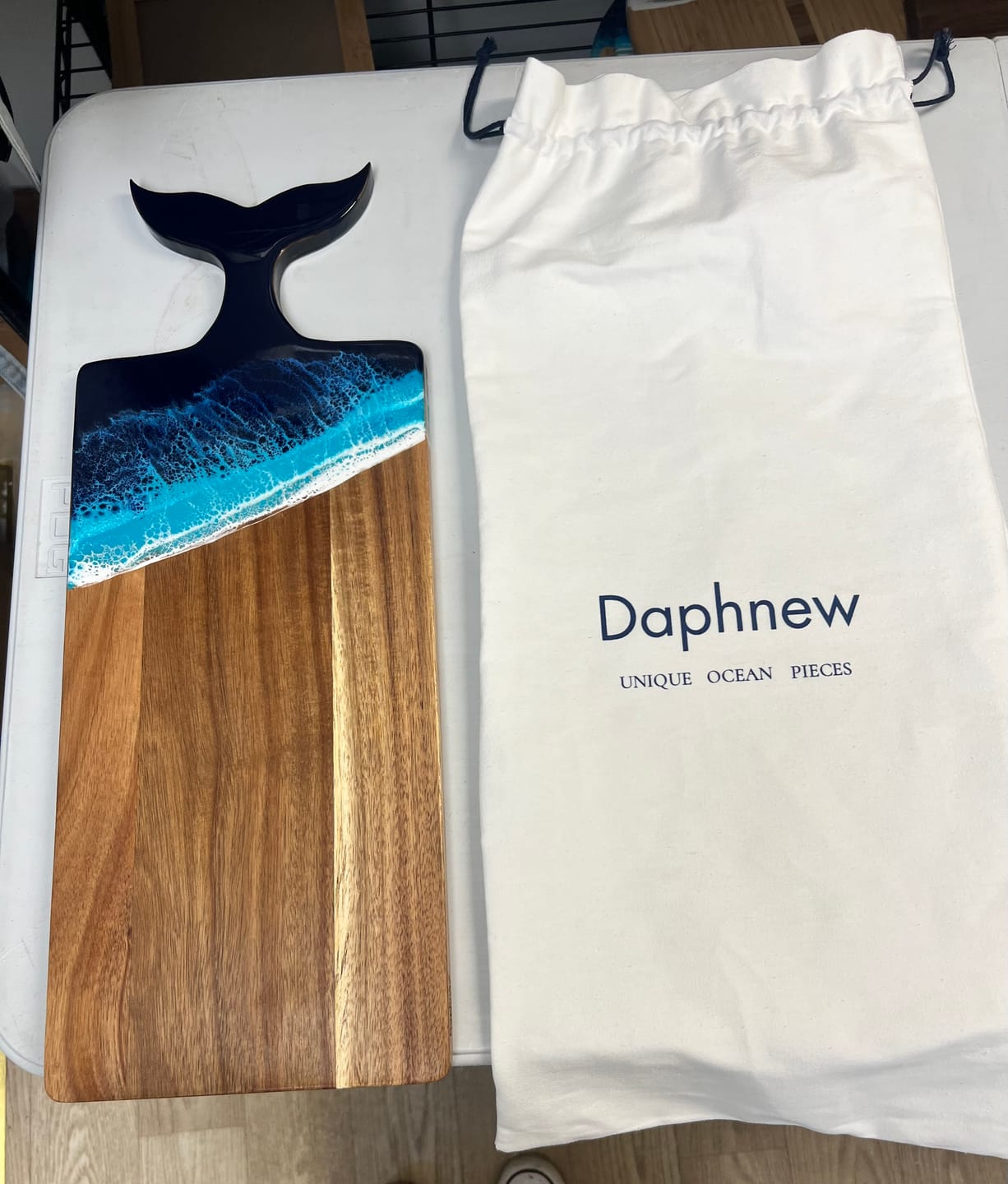 Customer photo review of Logo Engraved Whale Tail Boards For Business and Event Gifting