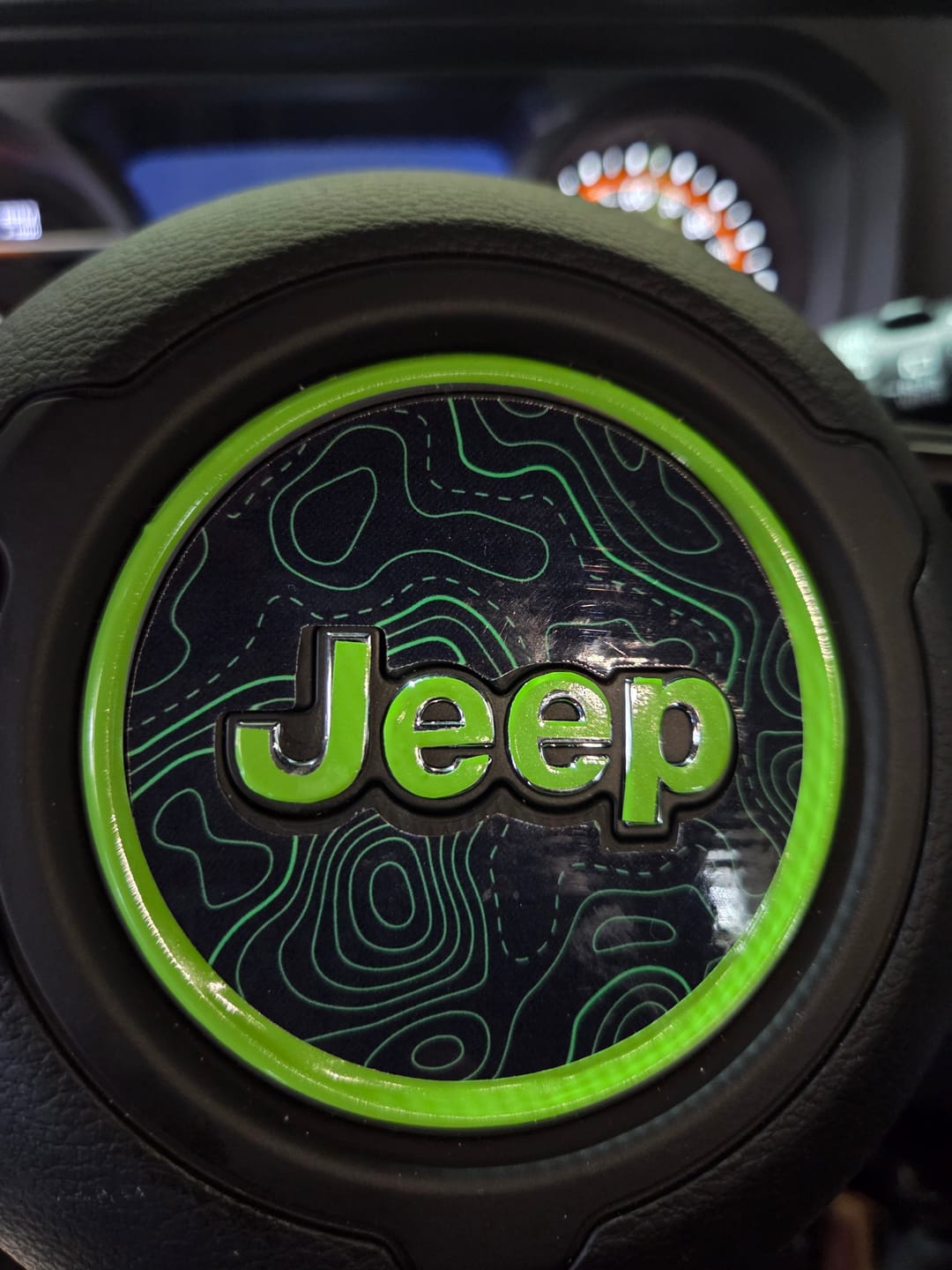 Customer photo review of JEEP Steering Wheel Emblem Overlay Decal — 30+ Colors & Designs (Flag, Topo, Animal, Solid)