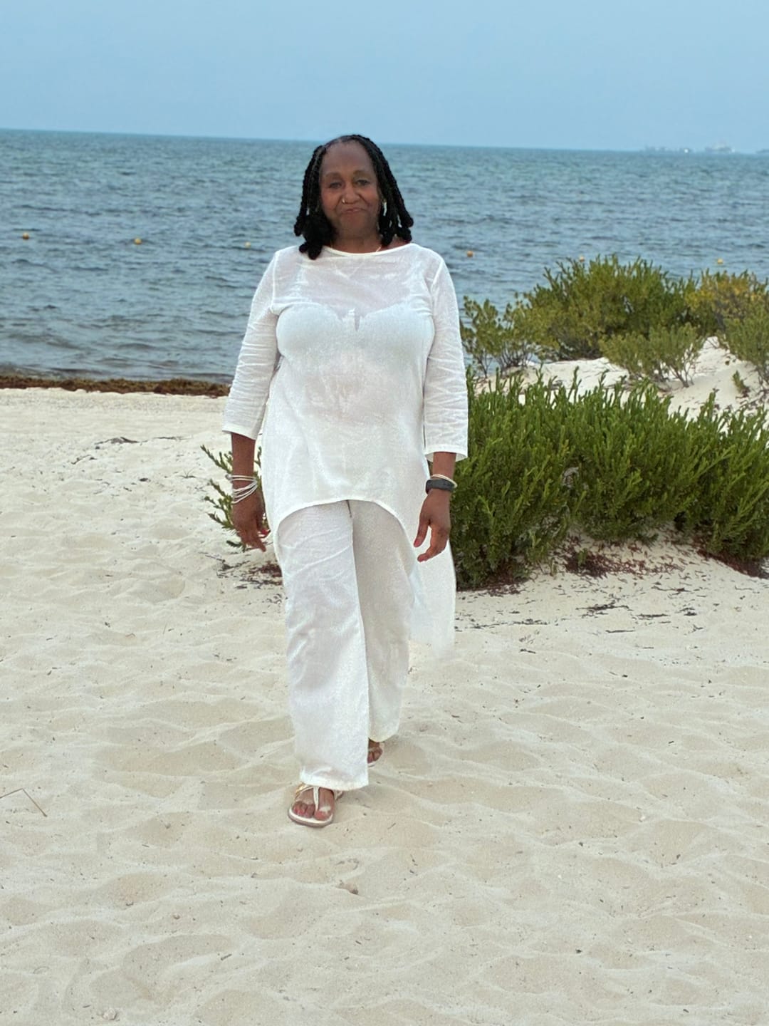 Customer photo review of Asymmetric Solid Color High Waist High-Low Round-Neck Tops + Wide Leg Pants Bottoms Two Pieces Set