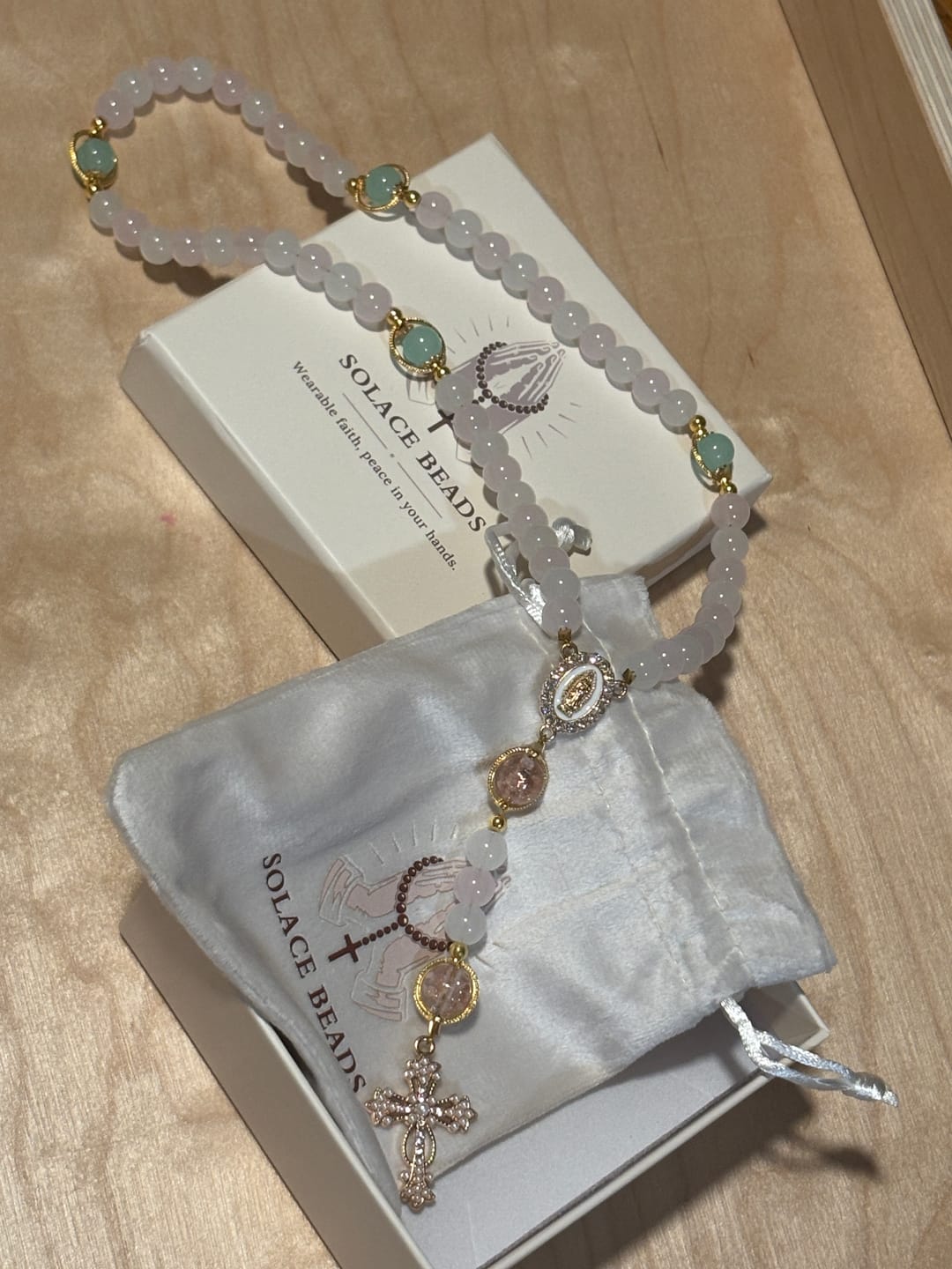 Customer photo review of SolaceBeads Artistic Pink & White Beaded Rosary: A Fusion of Colors & Sacred Symbols