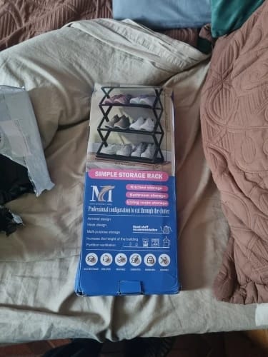 Customer photo review of Four-Tier X-Frame Shoe Rack with Dustproof Shelf Covers