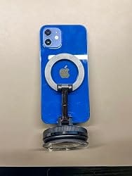 Customer photo review of Foldable Vacuum Suction Cup Phone Holder – Double-Sided Magnetic Desk Stand for iPhone & Android