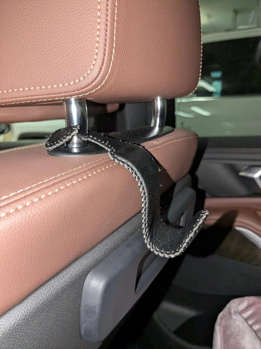 Customer photo review of BOLTHUT™ Leather Car Headrest Hooks — Back-Seat Bag Hangers