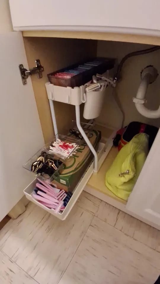 Customer photo review of Space Saving 2-Tier Under-Sink Pull-Out Storage Organizer for Kitchen & Bathroom