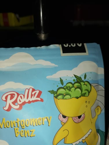 Customer's packaging for Rollz Blueberry Muffin THC-A flower showing a cartoon character with green buds on its head.