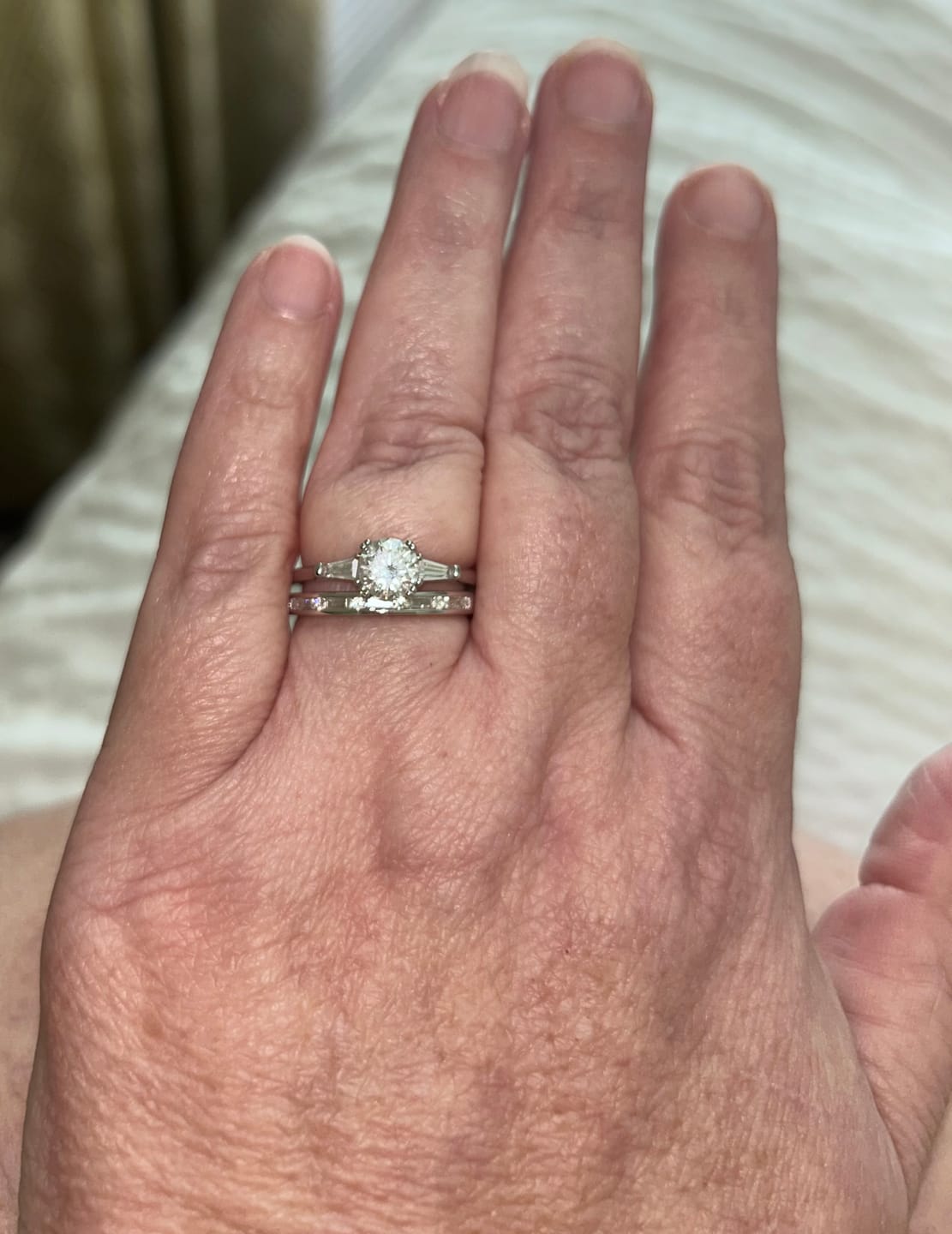 Customer photo review of Three Stone Round Moissanite Tapered Baguette Engagement Ring