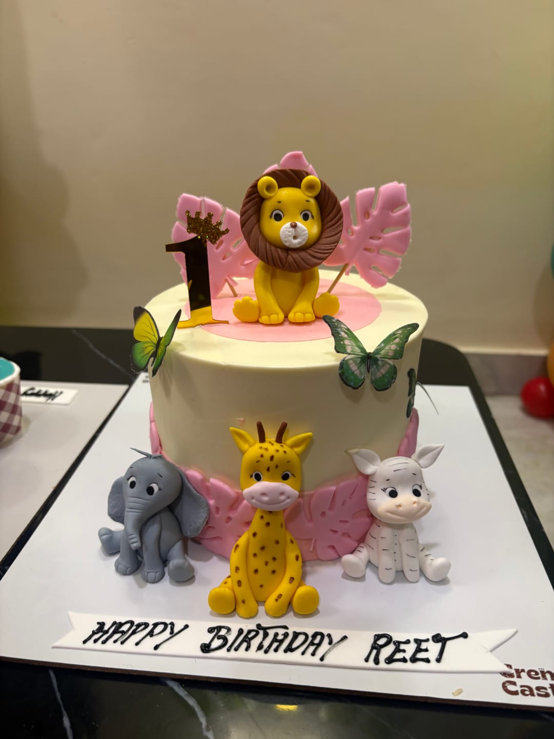 Customer photo review of Jungle theme pink Cake