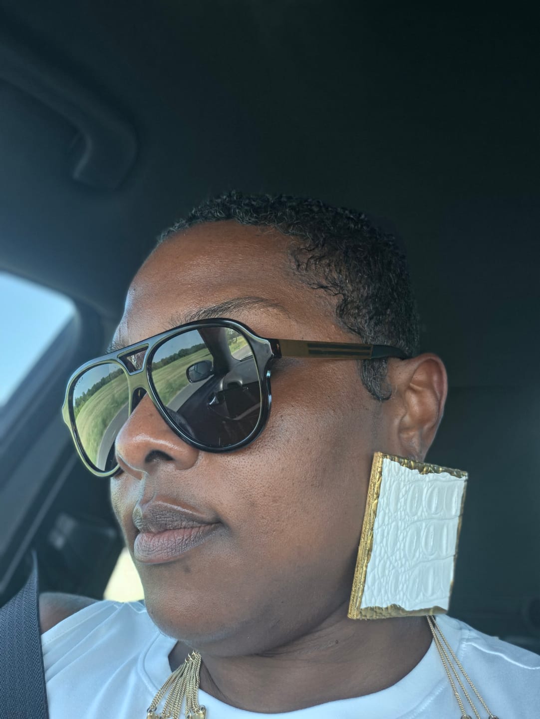 Customer photo review of Grand LUX Stud Earrings - 22 Colorways