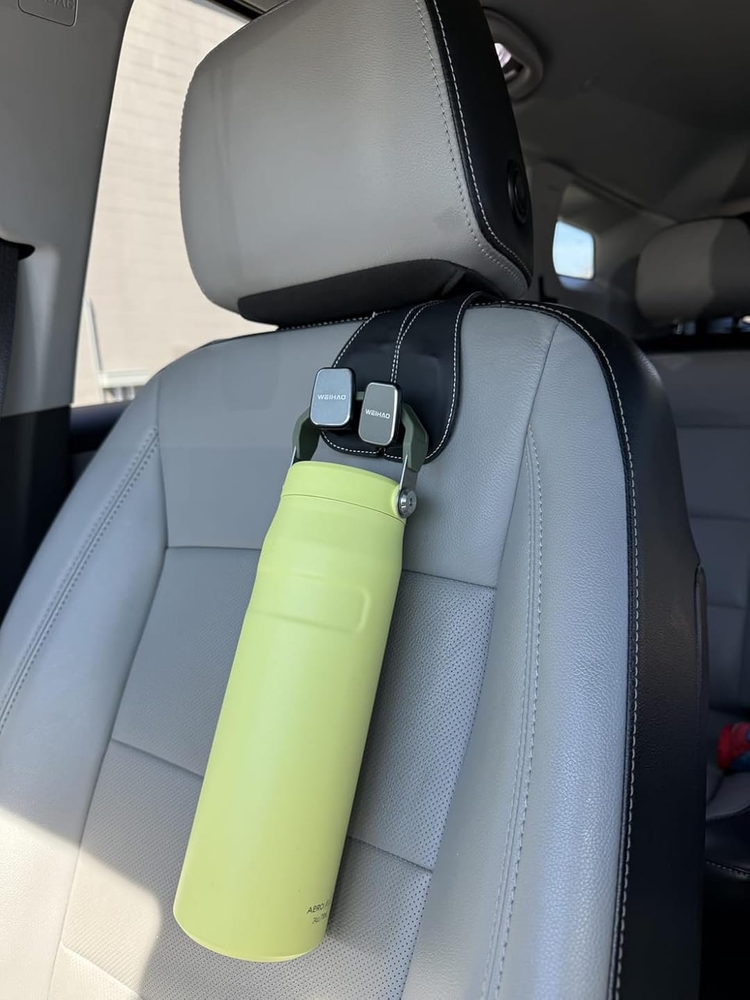 Customer photo review of BOLTHUT™ Leather Car Headrest Hooks — Back-Seat Bag Hangers